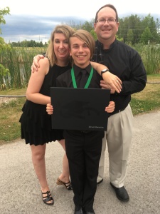 My mom, dad and I after my graduation.